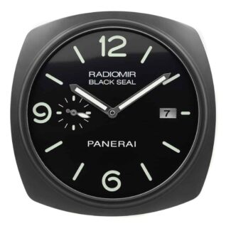 Panerai wall clock with a rounded square black frame, black dial, pale-colored numerals, "RADIOMIR BLACK SEAL," "PANERAI" text, a small subdial, and date display at three o’clock.